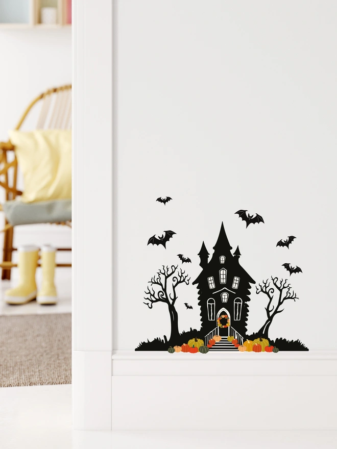 Spooky fairy door decal with haunted house design