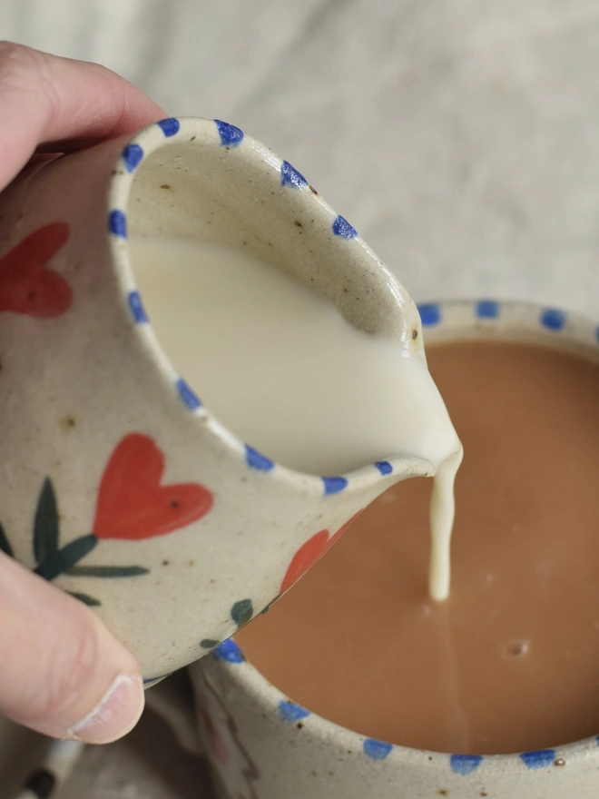 small milk jug with heart pattern 