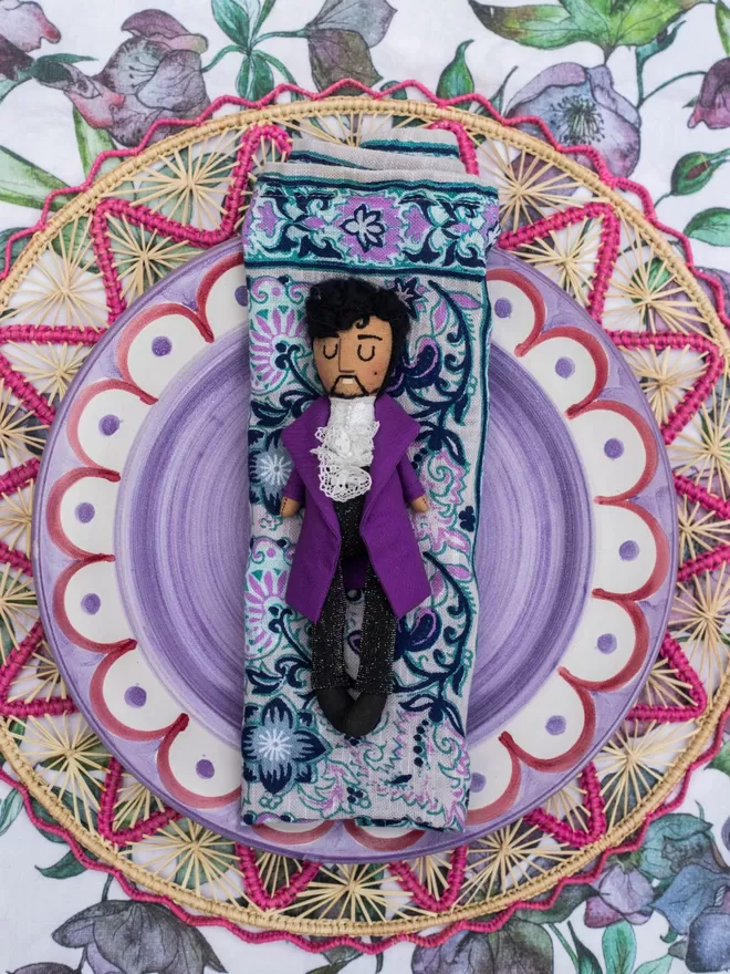 Prince seen on top of a table setting.