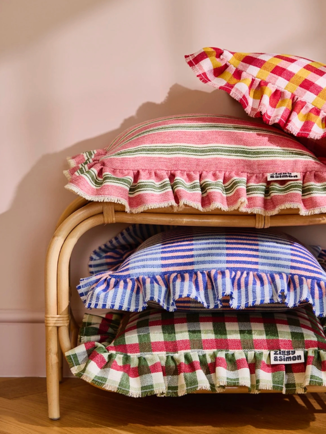 Blueberry Pie Cushion. Multiple cushions. Blueberry pie is second from the bottom.