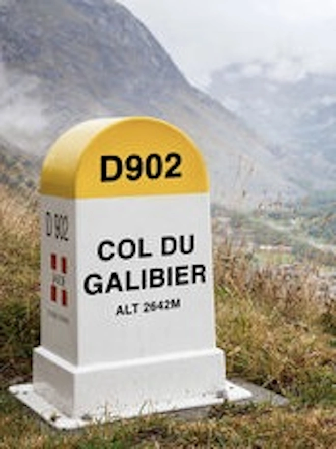 Personalised Tour De France Mountain Road Sign, yellow Col Du Galibier sign in the outdoors on a road. 