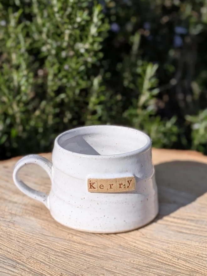Personalised Stoneware Coffee Cup. A rustic handmade mug in rustic white.