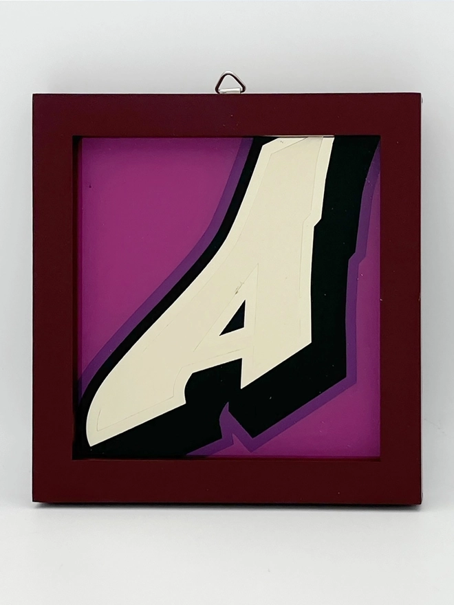 Gold leaf letters framed