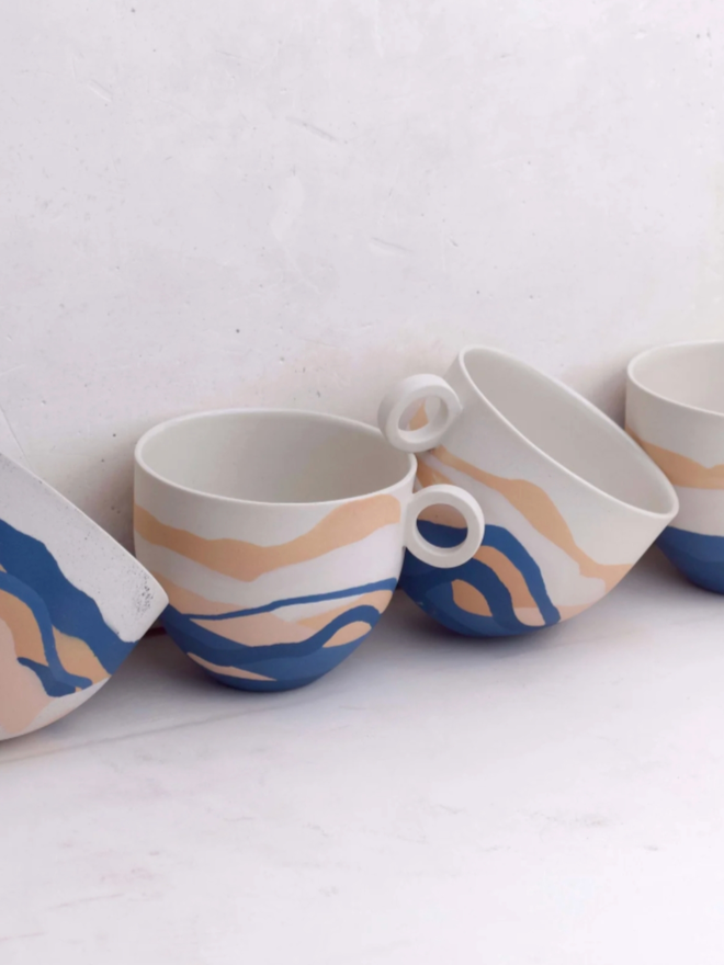 Shore Dreamlands Mug. A selection of mugs from the Shore Dreamlands collection, showing typical variation in decoration.