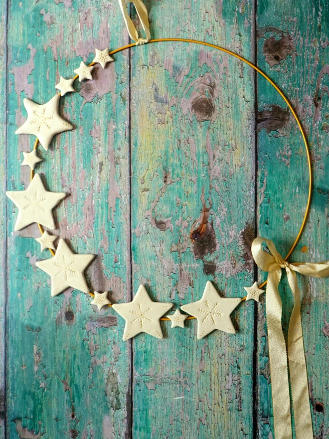 ceramic star wreath, christmas wreath, ceramic christmas wreath, star wreath, ceramic stars, christmas star decorations, christmas decor, christmas wall hangings, christmas unique home decor, Jenny Hopps Pottery