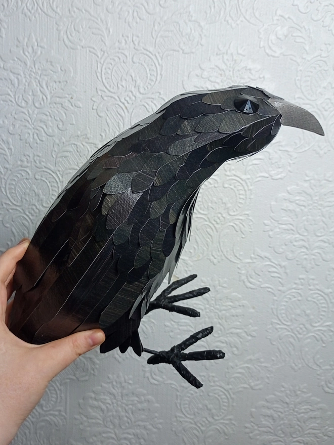 side view of the crow paper sculpture