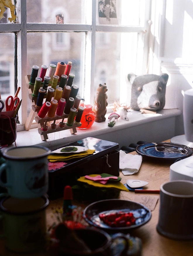 Sewing equipment at a desk 