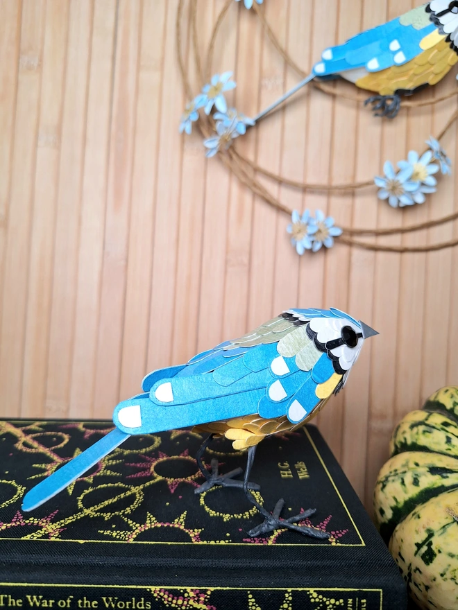 back view of a blue tit made from paper