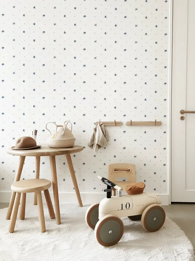 Ensueño Wallpaper, a living room with a colourful wallpaper. 