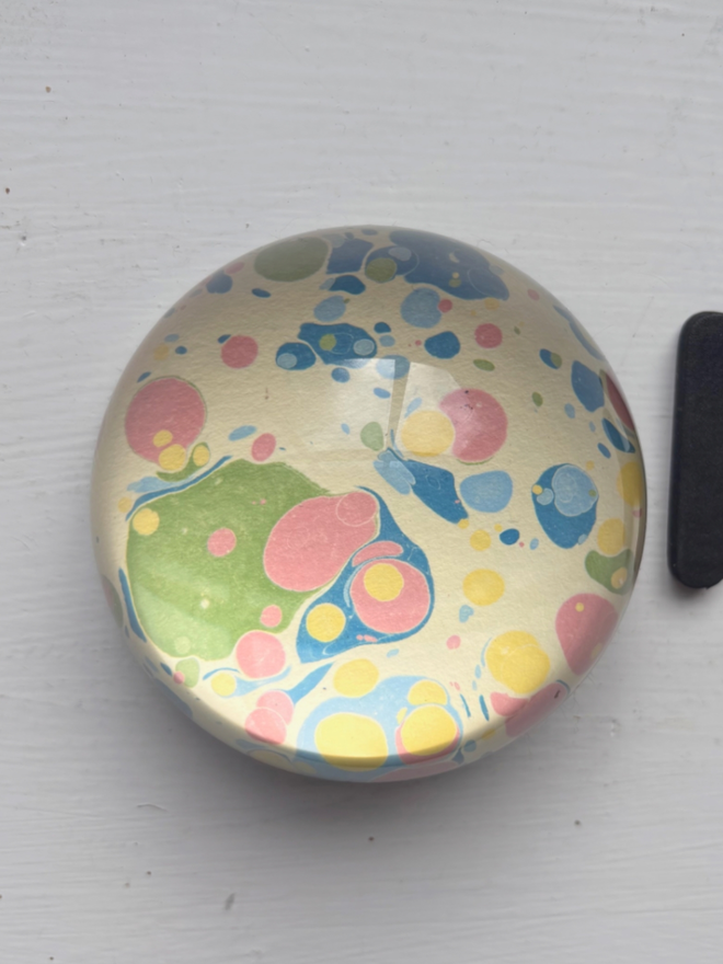 Small Paperweight. A paperweight in H.