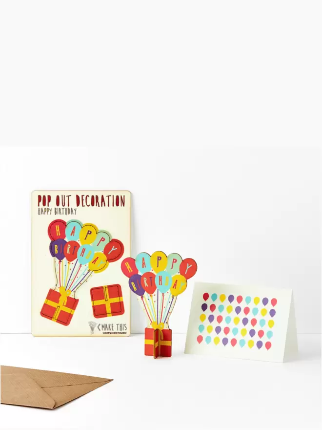 Birthday balloons birthday decoration and birthday balloon pattern birthday card and brown kraft envelope on a white background
