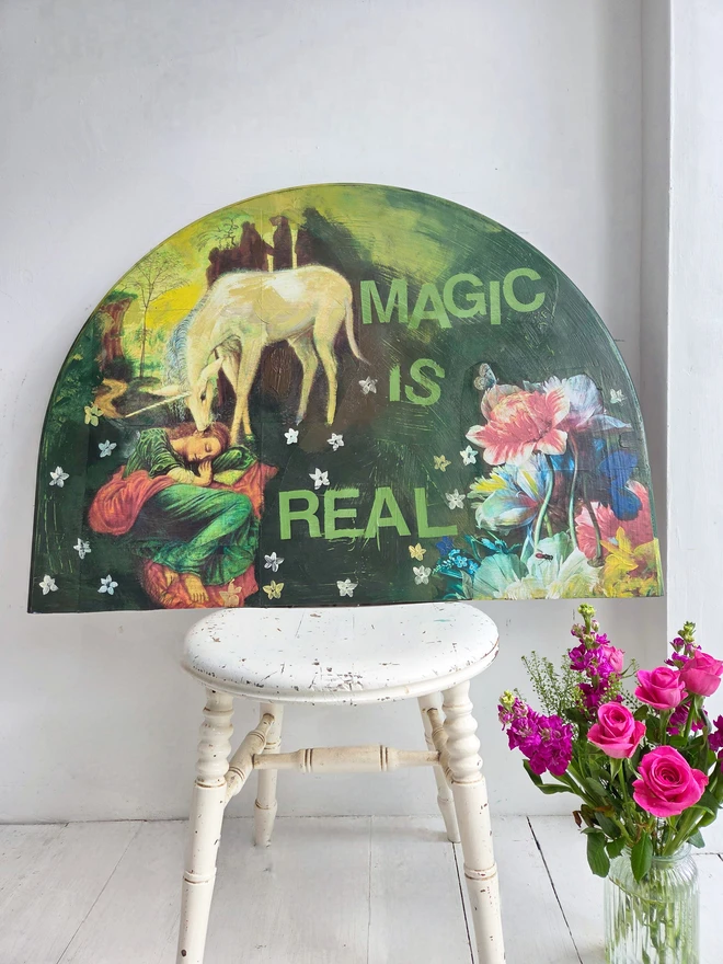 A magical unicorn art panel made from a reclaimed table-top