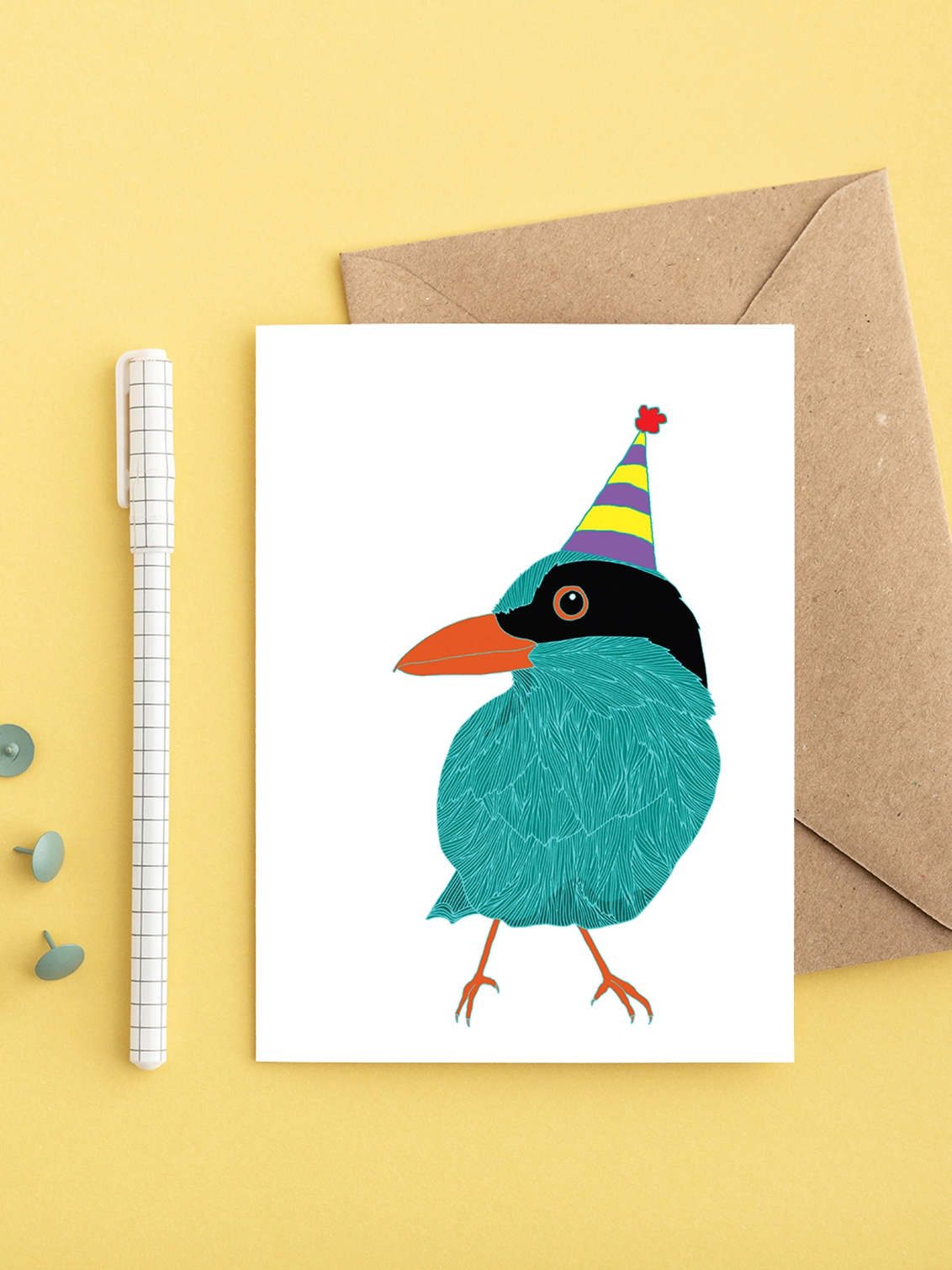Bright greeting card featuring a green bird in a hat