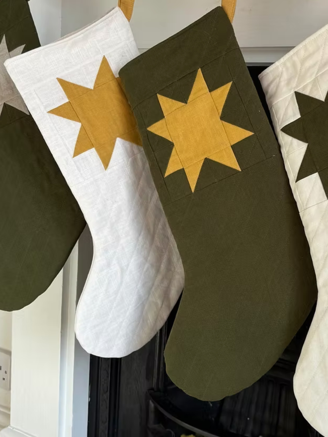 Medium Star Quilted Linen Christmas Stocking. A selection of stocking designs.