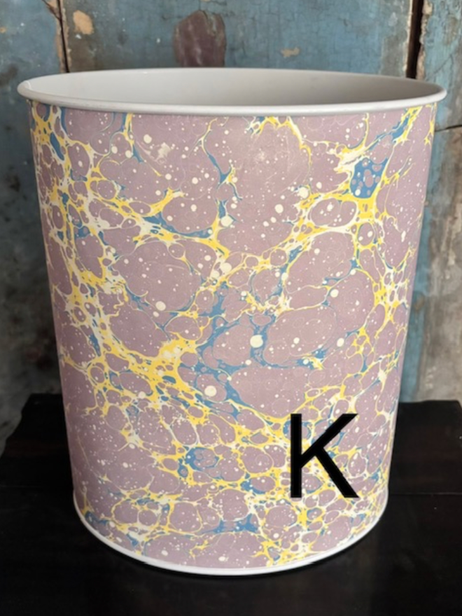Oval Waste Paper Bin. A bin in K