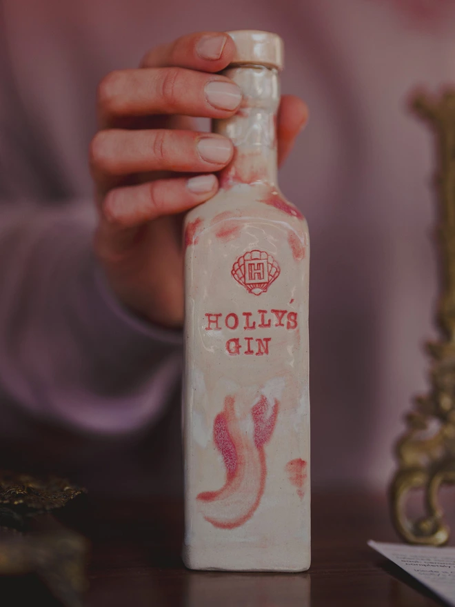 Holly Holding Pink White Ceramic Gin Bottle