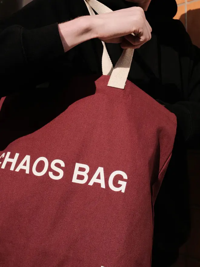 'Chaos' Tote Bag, being worn. 