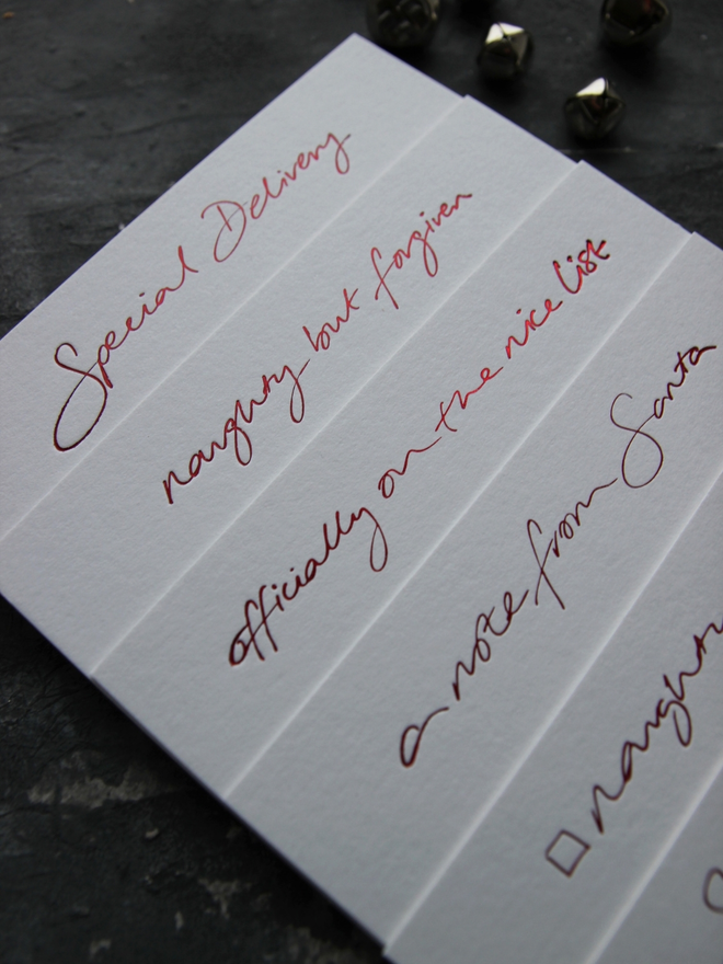 mixed set of hand foile Santa notecards blank for you to write messages, they come with matching envelopes foiled with North Pole Mail