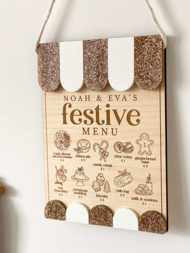 Personalised Wooden Christmas Play Menu. A Christmas play menu in gold glitter.