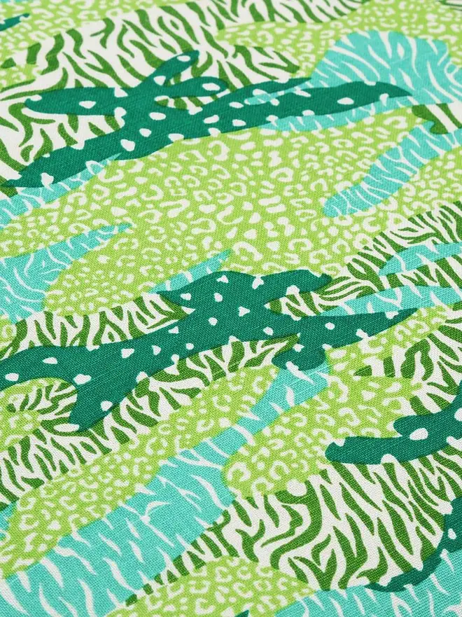 Green Big Cat Camo Duvet Cover And Pillowcase, a green duvet cover sitting on a plain surface. 