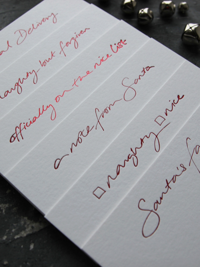 mixed set of hand foile Santa notecards blank for you to write messages, they come with matching envelopes foiled with North Pole Mail