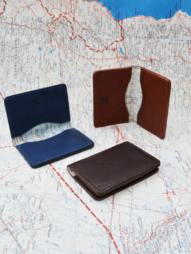 Original Silk Lined Escape Map Leather Card Holder in all three colours seen on a map.