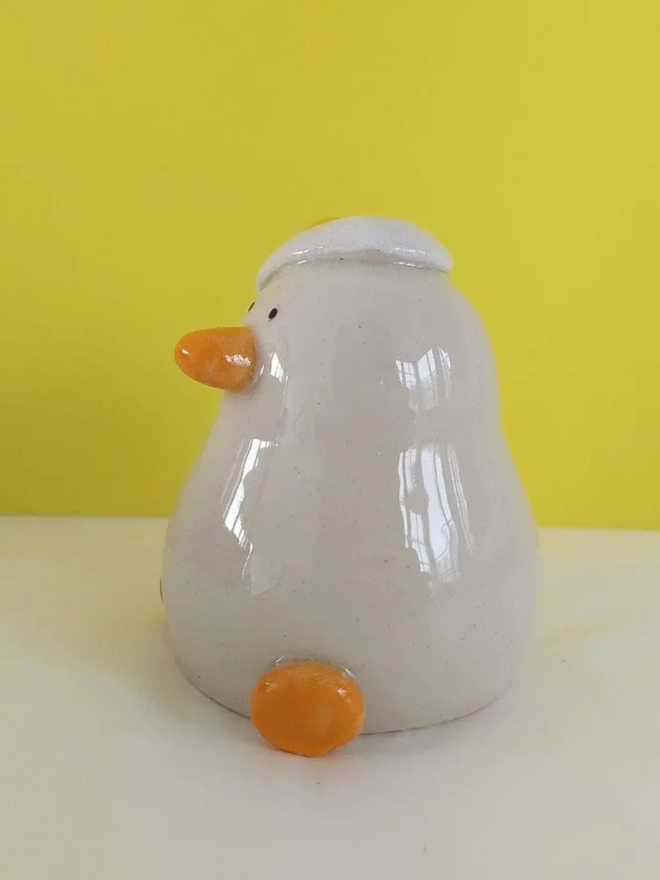 Duck egg head ceramic sculpture