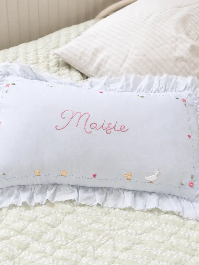 Soft blue linen ruffle trim cushion hand embroidered personalised heirloom keepsake girls bedroom vintage floral nursery