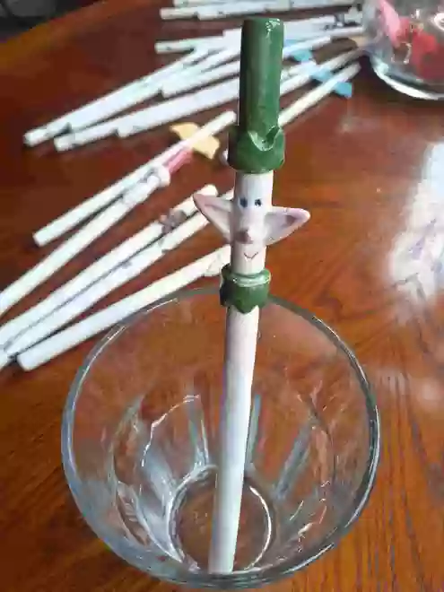 Ceramic Elf Straw in a glass