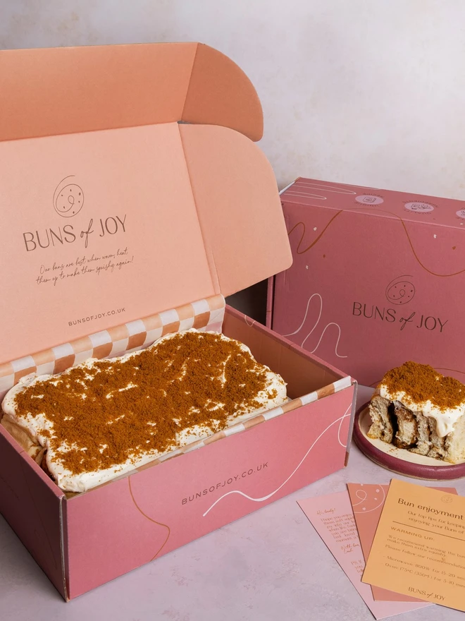 A gift box with Buns of Joy Biscoff Cheesecake Buns 