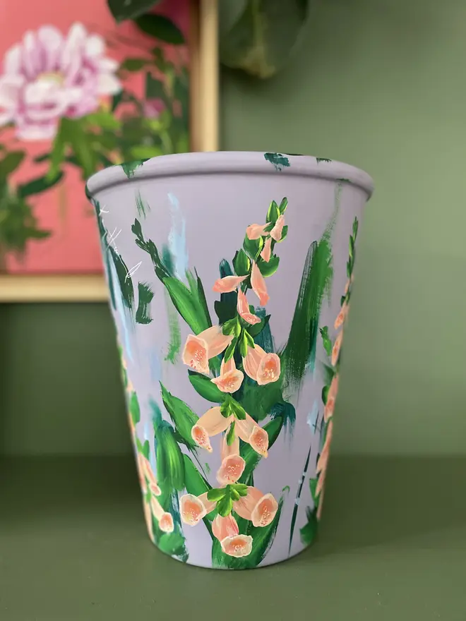 hand painted floral terracotta interior plant pot lilic background apricot foxglove flowers