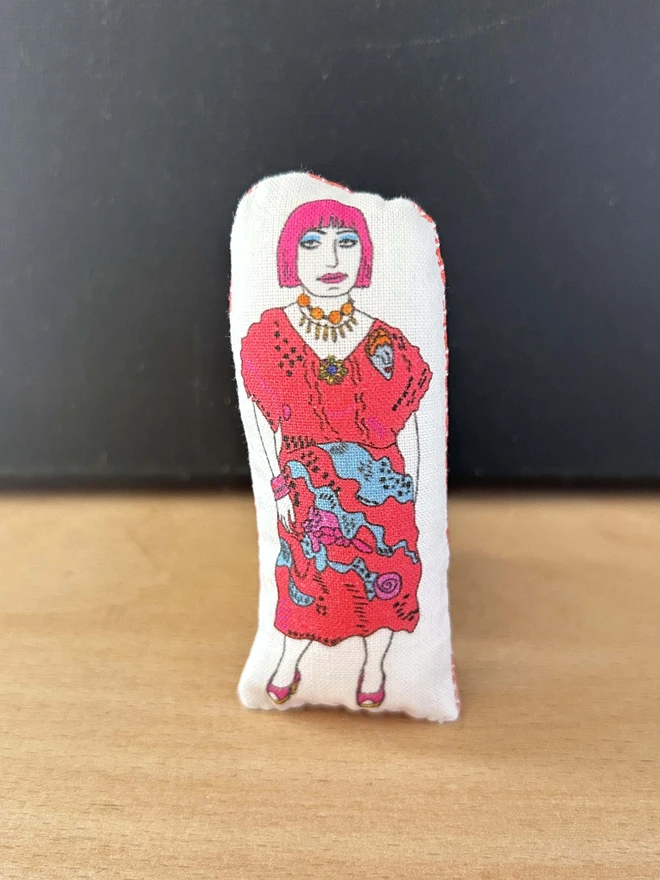 Mini illustrated fabric doll of British fashion and textile designer Zandra Rhodes.