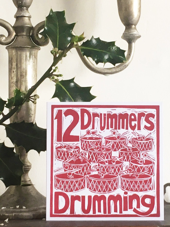 Christmas card Twelve Drummers Drumming The Twelve Days of Christmas linocut design by Kate Guy