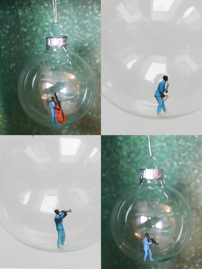 Miniature figures of Jazz musicians, each in a glass Christmas bauble (part of jazz band)