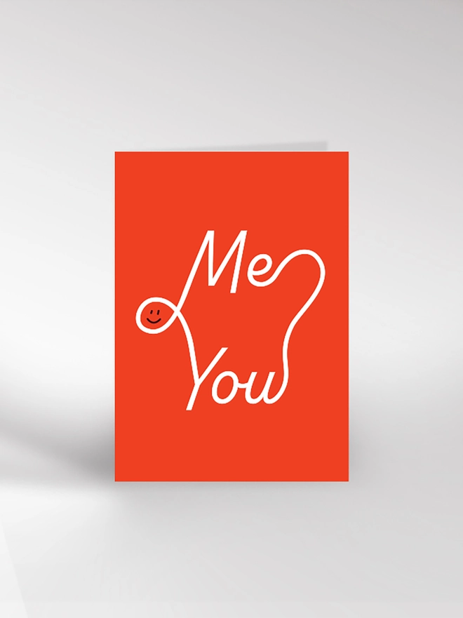 A typographic Valentine's or anniversary card featuring the words 'Me' and 'You' connected together