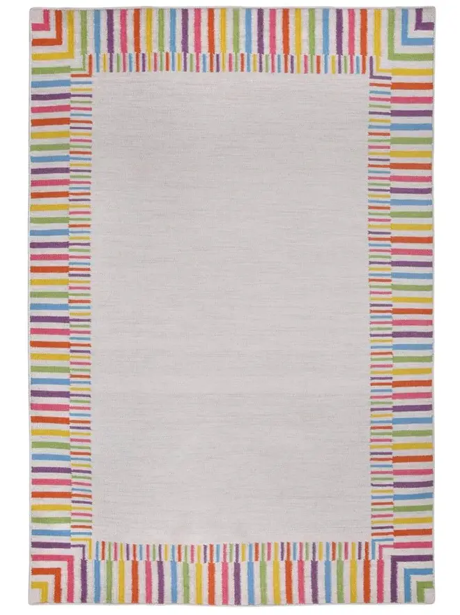 Rainbow Border Flatweave Rug, a rainbow rug sitting on a plain surface. 