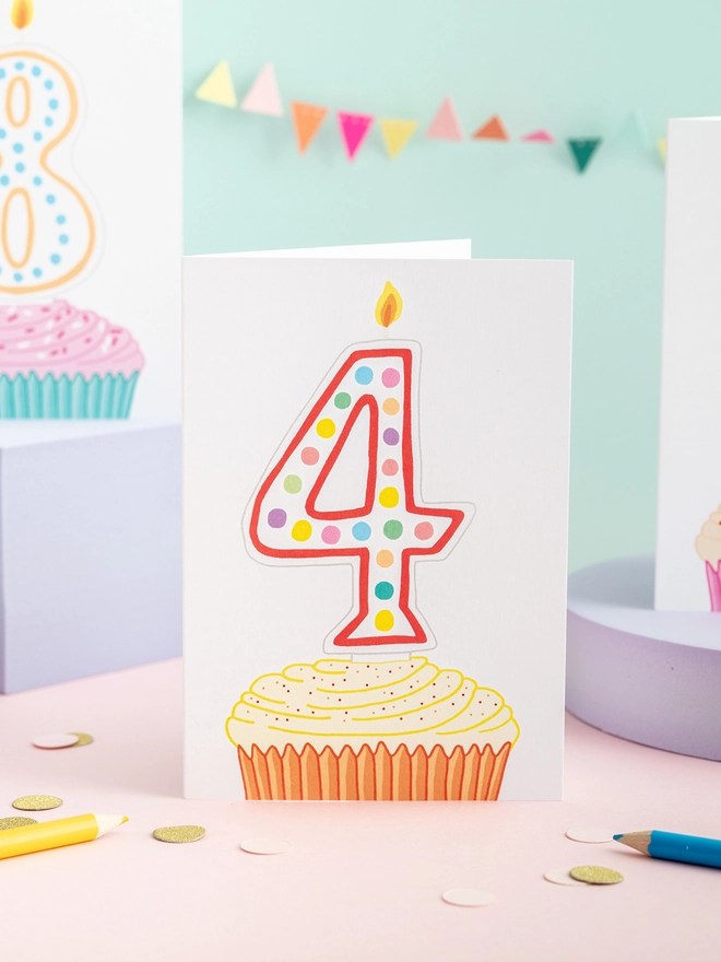 A sweet fourth birthday card featuring a cupcake and candle