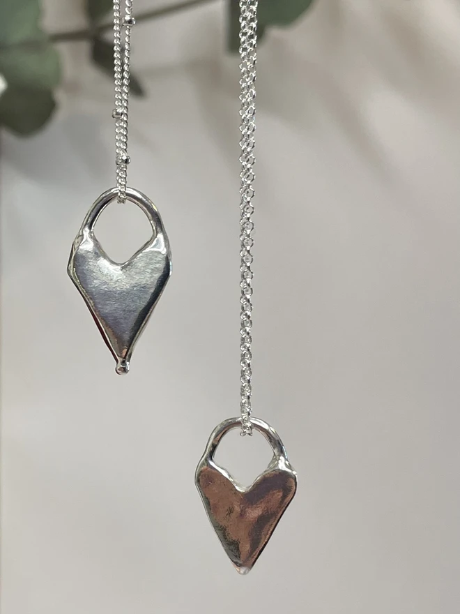 Hand made heart charms made from 100% recycled sterling silver, cute gift for girlfriend or wife for Valentine's Day or Mother's Day. Send straight to your special someone. Made by Celina C Jewellery, a small business in the UK, find on Holly and Co.