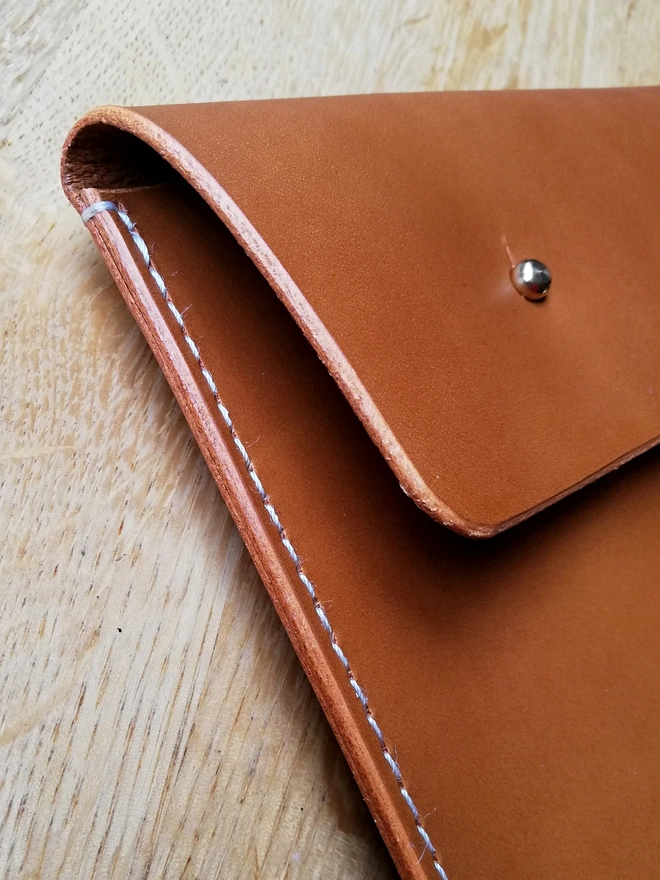 Hand stitched travel case