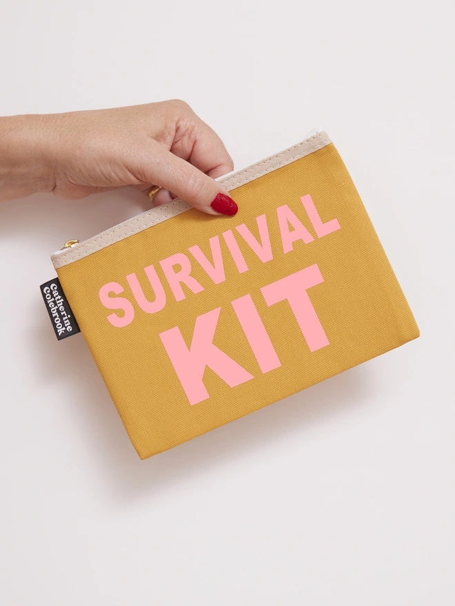 CATHERINE COLEBROOK SURVIVAL KIT POUCH MUSTARD:SALMON