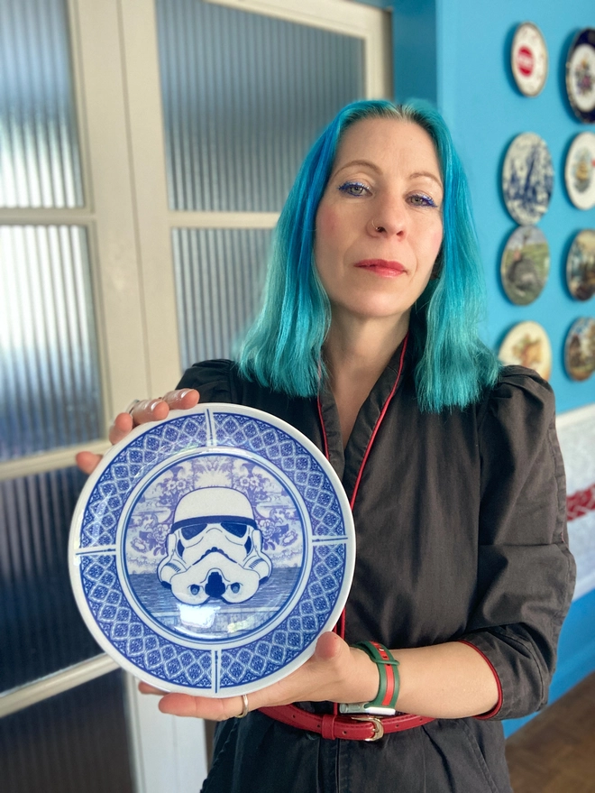 Delft style blue and white 8" plate featuring a Stormtrooper head in the centre