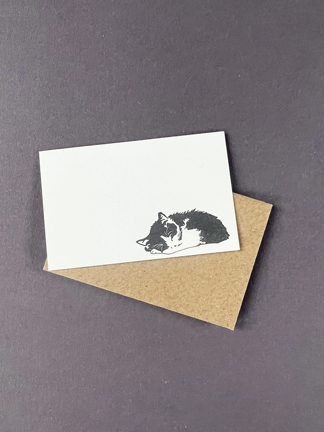 Letterpress tiny note illustrated with a sleeping cat and a kraft brown envelope 