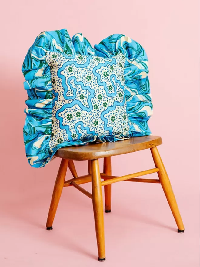 Frilly Fancy In Cornflower on a chair