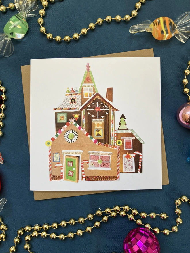 Wobbly gingerbread mansion christmas card and envelope with decorations