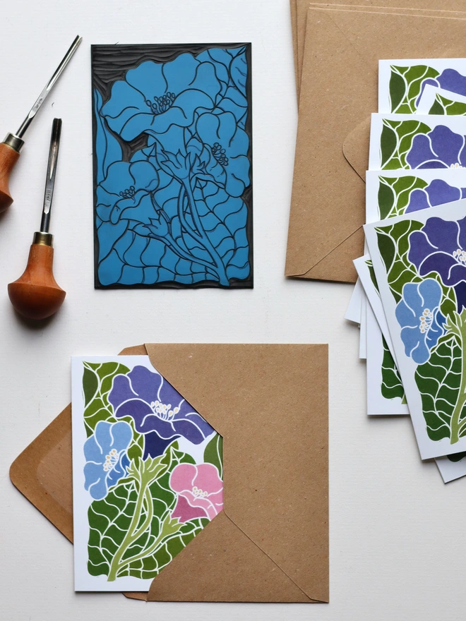 Modern botanical greeting cards with hand-carved morning glory design printed on eco-friendly recycled card stock