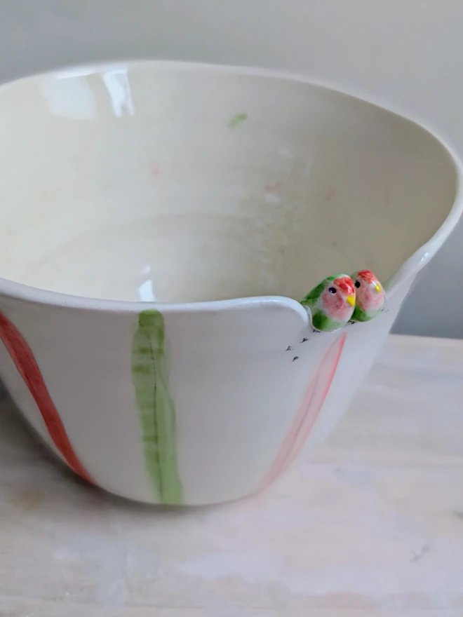 lovebird bird couple ceramic bowl or planter with pink, red and green stripes, hearts and splatters