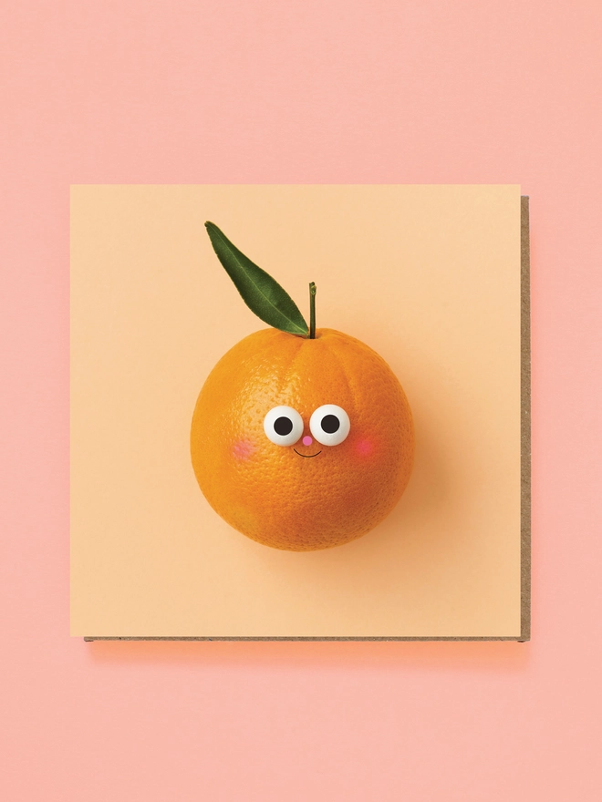 A cute orange with a smiley face