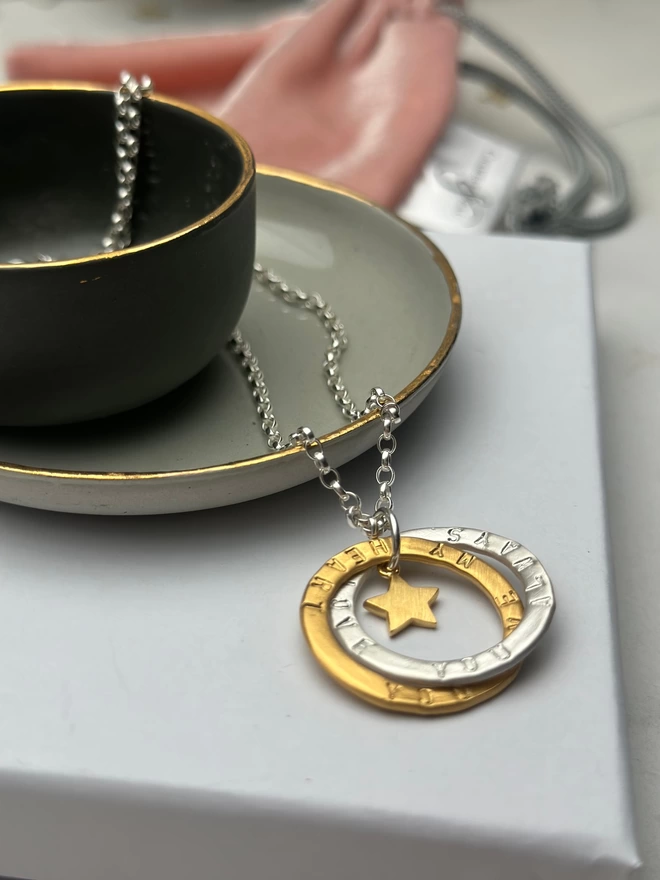 sterling silver chain with personalised intertwined open circle charms in sterling silver and gold plate with gold mini star charm