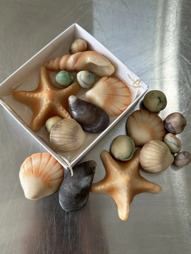 rock pool marzipan gift box. a selection of starfish, shell and pebble marzipan shapes.