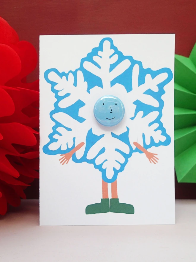 snowflake costume christmas greeting card with pin badge